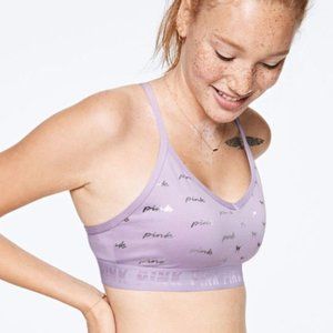 Ultimate lightly lined sports bra, VS Pink Purple dogs/logo